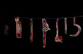Forum Novelties Bloody Weapon Garland 6ft Halloween Banner Decoration